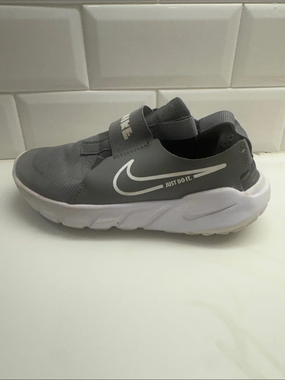 Nike Kids Gray Strap Slip-On Sneakers